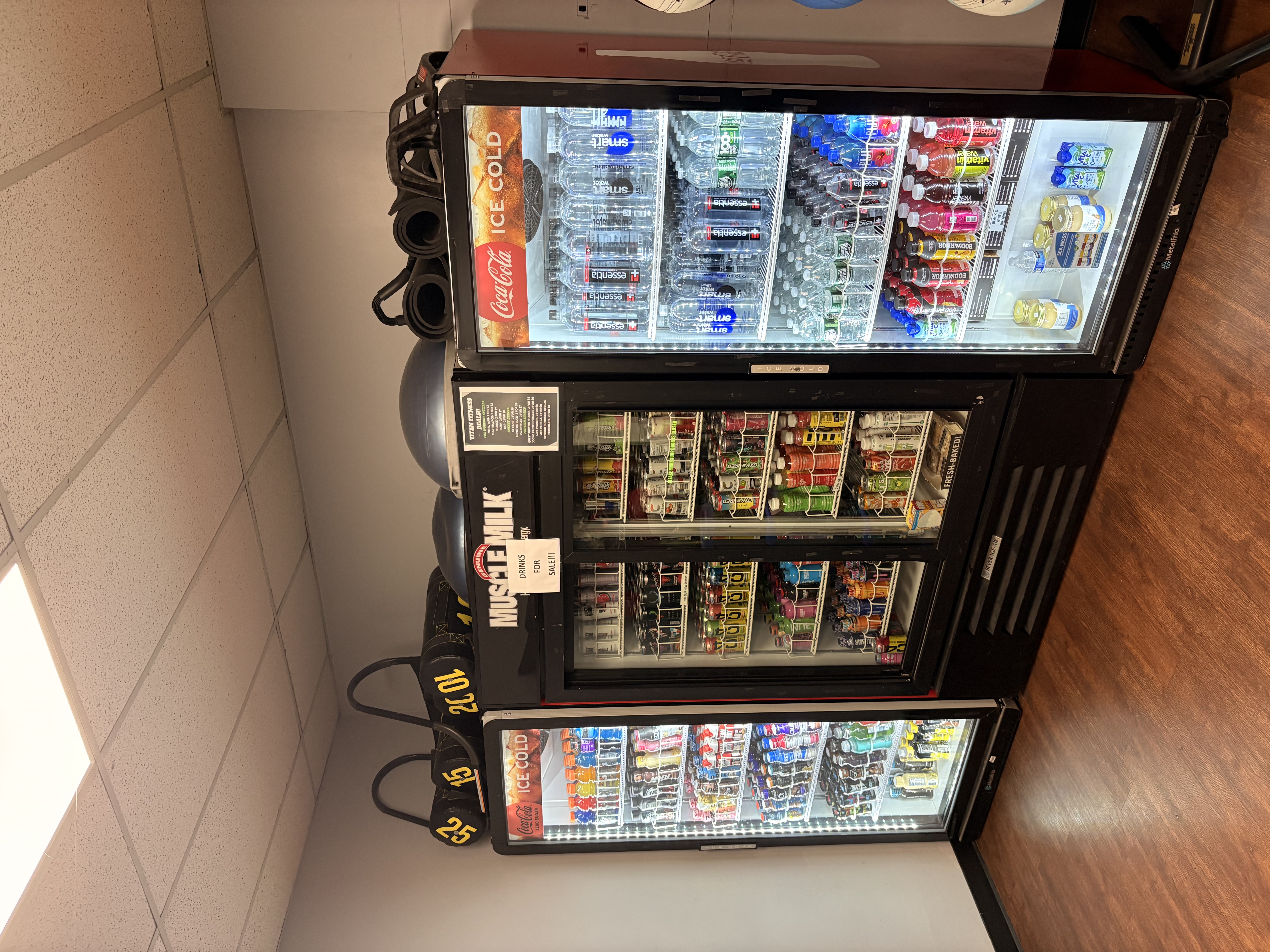 Cold drinks and refreshment station at Titan Fitness